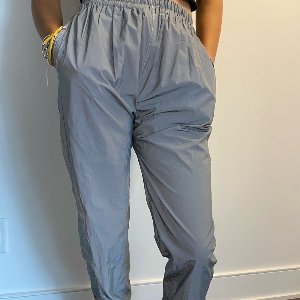 Super sick shiny track pants 🤍